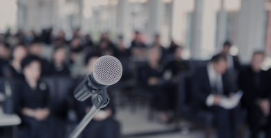 Microphone with people in the background